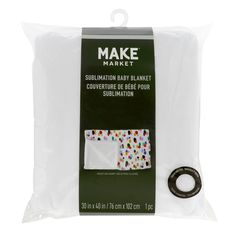 the packaging for make market's baby blanket is white with multicolored dots