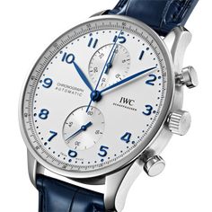 The harmoniously designed chronograph with its peripheral precision scale and recessed totalizers has been the most coveted member of the Portugieser family since 1998. Elegant Chronograph Watch With Tachymeter, Classic Chronograph Watch With Analog Display For Formal Occasions, Classic Formal Chronograph Watch With Analog Display, Timeless Chronograph Watch For Formal Occasions, Classic White Gold Watch With Analog Display, Classic White Gold Chronograph Watch Accessories, Classic White Gold Watch Accessories With Tachymeter, Classic White Gold Chronograph Watch, Timeless Chronograph Watch With Analog Display