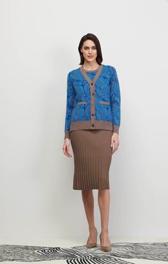 Capture the imagination with this luxe cardigan, marked by a silky hand feel and an artisanal allover paisley birdseye jacquard in deep blues and brown. The rich pattern is enthralling. Fitted Cardigan, Fine Yarn, Mother Of Pearl Buttons, Fall Collections, Stitch Design, Knit Cuff, Spring Collection, Summer Collection, Sustainable Fashion