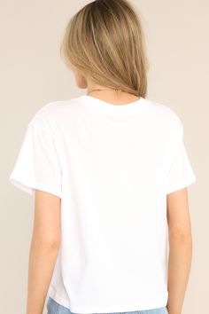 Keep it simple and stylish with the white Z Supply My Go To Tee. This plain white tee is the perfect addition to any wardrobe, offering endless pairing possibilities. This tee features a ribbed crew neckline, a relaxed fit, and short sleeves. Comfortable and versatile, it's the go-to choice for a casual and effortless look. 100% Cotton Machine Wash Cold Imported Model is wearing a size x- small White Cropped T-shirt With Crew Neck, White T-shirt With Ribbed Neckline For Everyday, White T-shirt With Ribbed Neckline And Relaxed Fit, White T-shirt With Ribbed Neckline For Spring, Trendy Relaxed Fit T-shirt With Ribbed Neckline, White Cotton Cropped T-shirt For Everyday, Everyday White Cotton Cropped T-shirt, White Relaxed Fit Minimalist Top, Casual White Short Sleeve Top For Everyday