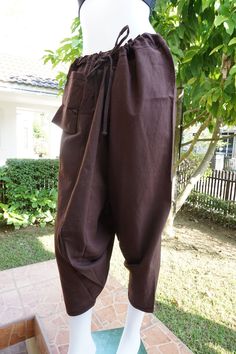 "⬇️ SHOP HERE https://www.etsy.com/ch-en/shop/IndycraftsDesigns Aladdin Pants, Harem Pants 100% Cotton Unisex pants, perfect for yoga, The fabric is cotton soft, lightweight, and airy, ideal for those warm days. If it's a bit chilly, you could always wear leggings underneath. super comfortable cotton pants made of light, comfortable to wear 100% cotton. Cotton is a natural material that wicks moisture to keep you cool, comfy & dry. Floral printed, elastic waistband,medium-weight, Soft and Co Brown Baggy Bottoms For Festival, Brown Baggy Pants For Festival, Traditional Long Pants Bottoms With Pockets, Traditional Bottoms With Pockets In Long Pants Style, Traditional Brown Cotton Bottoms, Traditional Brown Cotton Pants, Brown Harem Pants With Pockets, Brown Harem Bottoms With Pockets, Baggy Brown Festival Pants