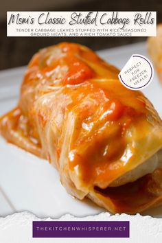 a close up of a piece of food on a plate with the words men's classic stuffed cabbage rolls