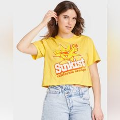 Women's Sunkist Cropped T-Shirt, Yellow, Sizes Xs, L, Xl, Xxl Retro Cotton Cropped T-shirt For Summer, Retro Crew Neck Cropped T-shirt For Summer, Summer Graphic Tee Crop Top With Screen Print, Retro Cropped T-shirt For Summer, Summer Crop Top With Screen Print And Relaxed Fit, Summer Relaxed Fit Crop Top With Screen Print, Relaxed Fit Summer Crop Top With Screen Print, Summer Crew Neck Crop Top With Screen Print, Casual Yellow Crop Top With Graphic Print