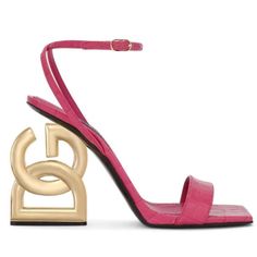 Dolce & Gabbana 3.5 105mm Crocodile-Embossed Leather Sandals Pink Gold Women’s Eu 40.5/Us 10.5 $1,245. New In Box. Dolce & Gabbana 3.5 105mm Crocodile-Embossed Leather Sandals Dolce & Gabbana Takes Branding To The Next Level With These Hot Pink Calf Leather Sandals. Designed With An Embossed Crocodile Effect, Each Shoe Sits Atop A Sculpted 'Dg' Heel In A Gold-Tone Finish, Creating A Bold And Unique Reference To The Italian Label. Highlights Hot Pink Calf Leather Embossed Crocodile Effect High Sc Luxury Pink Ankle Strap Sandals, Luxury Pink Sandals With Sculpted Heel, Luxury Pink High Heel Sandals, Pink Luxury Sandals For Formal Occasions, Luxury Pink Sandals With Padded Heel, Luxury Pink Sandals With Heel Strap, Luxury Pink Ankle Strap Heels, Luxury Pink Evening Sandals, Luxury Pink Heels With Sculpted Heel