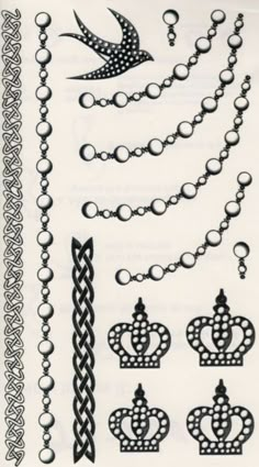 an assortment of different types of chains and rings on a sheet of paper with black ink