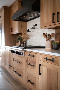 a kitchen with wooden cabinets and white counter tops