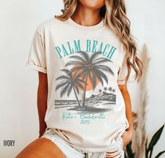 Get ready for your next beach vacation with our custom beach tee. Any of the text on this shirt can be customized for your bachelorette party vacation or girl's trip! * Please enter your group name, location, and date in the personalization box prior to check-out.   We use professional quality DGT printing on all our apparel. Direct-to-garment, or DTG, is a high quality printing method that sprays ink directly onto the garment so there is no peeling or cracking. This fabulous graphic will be pri Vacation Beach Party Shirt With Graphic Print, Trendy T-shirt For Beach Party Season, Graphic Print T-shirt For Summer Beach Party, Summer Beach T-shirt With Custom Print, Bachelorette Party Vacation, Fun Beach T-shirt With Custom Print, Custom Print T-shirt For Beach Vacation, Beach Vacation Custom Print T-shirt, Bachelorette Shirts Beach