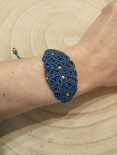 A bracelet full of style and elegance. I present to you a deep blue bracelet that is handmade in micromacramé. This is a classic boho design, in which I have integrated faceted zamak beads with a fine gold plating and spherical stainless steel beads in gold into an elaborate weave full of filigree. It is an adjustable bracelet, which you can adapt to the contour of your wrist. Elegant, unique and boho, you will love it!! You can also combine it with the blue earrings: www.etsy.com/es/listing/158 Blue Macrame Beaded Bracelets As A Gift, Elegant Handmade Blue Friendship Bracelets, Adjustable Blue Macrame Jewelry, Elegant Macrame Bracelets As Gift, Elegant Blue Bracelet With Adjustable Length, Blue Macrame, Bracelet Macrame, Boho Design, Bracelet Blue