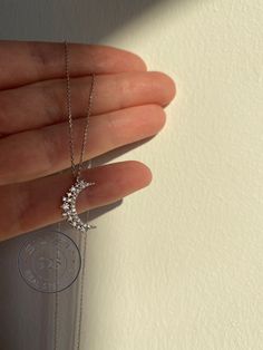 "SPRING SALE  Buy 1 item - Get 10% off Buy 2+ items - Get 20% off + Free worldwide shipping ❤ Welcome to My Store!❤ The minimalist silver moon pendant necklace is so romantic and dainty, perfectly suited for layering with more short necklaces. On the surface of the moon pendant, delicate cubic zirconia in various sizes are inlaid, making the jewel especially luxurious. ♦ materials ♦ ♦ Our crescent necklace made of 100% Sterling Silver and plated with a rhodium cover. ♦You can also purchase this Moon Shaped Sterling Silver Crystal Necklaces As Gift, Sterling Silver Moon-shaped Crystal Necklace, Sterling Silver Moon Shaped Crystal Necklace, Moon-shaped Sterling Silver Crystal Necklace For Gift, Silver Sterling Silver Moon Crystal Necklace, Silver Round Crystal Necklace With Moon Charm, Silver Moon-shaped Sterling Silver Crystal Necklace, Silver Crystal Necklace With Moon Charm For Gift, Moon-shaped Sterling Silver Crystal Necklace