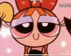 the powerpuff girls cartoon character with big eyes and an orange bow on her head