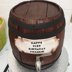 a birthday cake made to look like a barrel