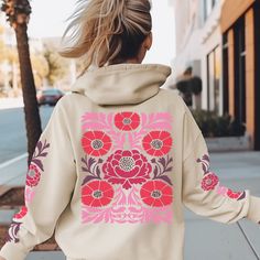 Get ready to turn heads and spread positive energy with our hippie style hoodie featuring a vibrant, eye-catching boho flower pattern on the back and on the sleeves. Designed for free spirits, this cozy hoodie is a must-have for those who love to express their individuality. The colors of the design are berry, pink, red and some purple, the trendy colors for spring 2024! Perfect for those who appreciate the laid-back, carefree spirit of the 60s and 70s. Whether you're heading to a music festival, a casual hangout, or just want to add a touch of boho-chic to your wardrobe, this hoodie is the ultimate statement piece. It's not just clothing; it's a mood, a lifestyle, and a celebration of individuality. Made with high-quality, soft, and cozy fabric, it's not only a fashionable statement piece Bohemian Hooded Hoodie For Fall, Bohemian Style Hooded Hoodie For Winter, Hippie Hooded Hoodie For Fall, Bohemian Hooded Hoodie For Winter, Bohemian Style Hooded Winter Hoodie, Bohemian Hoodie For Festivals, Bohemian Hooded Hoodie For Festivals, Spring Bohemian Hooded Hoodie, Bohemian Winter Festival Hoodie