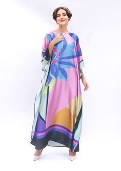 A full length kaftan plus size featured with aurora abstract line  will bring the elegant vibe of Spring/Summer and perfect for holiday occasions or any occasion you attend. The fabric is blended silk with more than 75% silk so the care is more easier with washing and iron, in addition less wrinkles. It's totally smoothly flowy, soft and gentle touch. FEATURES - Black, Purple, Pink, Green - Aurora Light - Personal Custom Made - Full Length Kaftan Half-Sleeves - Designer Silk Kaftan - Plus Size a Long Kimono For Beach Eid Festival, Multicolor Long Abaya For Spring, Beach-style Long Abaya For Eid, Bohemian Pink Maxi-length Abaya, Pink Bohemian Maxi Abaya, Pink Bohemian Maxi Length Abaya, Multicolor Bohemian Abaya For Beach, Long Abaya For Beach Eid Celebration, Eid Beach Kimono