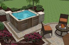 an outdoor hot tub in the middle of a garden