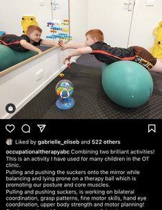 two young boys playing with toys in a room