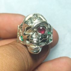 Life's the true face of Skull. Description: Style: Skull Ring With Snake Design  Color: Grey | Red Metal: Sterling Silver 925 Handmade: Yes, handmade artisan ring Will be Shipped Via FedEx Intl Priority Service. No Custom duty will be charged by our customers. Customer Policy: Your satisfaction is our priority. We guarantee you our products quality exceed its real value. All you questions will be answered within 12 hours or less. In case If you have any dissatisfaction please email us before fee Collectible Symbolic Skull Ring Stamped 925, Skull Shaped 925 Silver Ring Gift, 925 Silver Skull Ring Gift, Gift Skull Ring Stamped 925, To My Best Friend, Artisan Rings, Snake Design, 925 Ring, Skull Ring