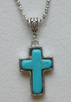 "CROSS: Zinc alloy / turquoise blue stone 1-1/4\" x 7/8\" CHAIN: Zinc alloy 18\" with lobster clasp. Come Visit Us at Our New Store! Please feel free to email me with questions about this item. Also please check my other listings. I am always available to answer your questions promptly. Buy from us with confidence." Stone Cross, Handmade Angels, Chain Pendant, Chain Pendants, Stainless Steel Chain, Blue Stone, Black Beads, Turquoise Blue, Pendant Necklaces