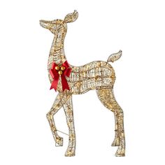 a christmas ornament with a red bow on it's head and tail