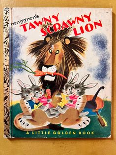 a children's book with an image of a lion surrounded by cats and mice