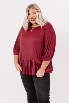 Plus Size -  Slay all day in our charming wine colored "Willow Walk" shift top featuring soft lightweight flowy tight knit material with subtle vertical ribbed texturing, a high rounded neckline, loose 3/4-length sleeves with fitted cuffs, and an ultra relaxed silhouette that falls into a peplum bottom with an uneven hemline!     Measurements 1XL :  Bust 48", Hip 50", Length 27", Sleeve Length 12", Waist 46".  2XL :  Bust 50", Hip 52", Length 28", Sleeve Length 12.5", Waist 48".  3XL :  Bust 52" Slay All Day, Rounded Neckline, Wine Colored, Women Clothing Boutique, Eye Black, Rectangle Shape, Online Boutiques, Online Womens Clothing, Boutique Clothing