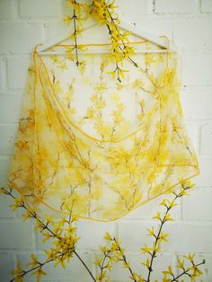 "Hand painted luxury silk chiffon scarf -Yellow Joy-Forsythia. Cheerful Yellow Blossoms in very pale transparent yellow background. Yellow color represents youth, fun, joy, sunshine and other happy feelings while Forsythia meaning is Anticipation. Can be quoted as \"good things come to those who wait\". And related with waiting for something or for someone (might be spring... or might be something beautiful...) This design Scarf is MADE TO ORDER and available in 2 SQUARE and 5 OBLONG sizes: 21*x Blossom Scarf, Yellow Blossom, Floral Shawl, Silk Chiffon Scarves, Spring Scarves, Chiffon Wrap, Small Scarf, Silk Scarf Painting, Yellow Silk