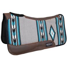 a brown and blue horse saddle cover with an ethnic design on the front, along with a black leather bottom