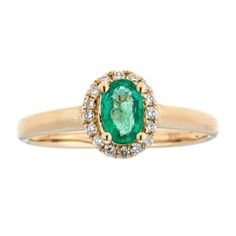 Showcasing a large prong-set oval Emerald, this Gin & Grace ring issurrounded with sixteen round-cut white diamonds. This eye-catchingring is crafted of 10k Yellow gold jewelry, creating a subtle blush. Gemstone colors: Green Gemstone shapes: Oval One prong-set oval-cut Emerald measures 4X6 Gemstone weight: 0.40 carat Total gemstone weight: 0.40 carat Diamonds: 16 Diamond cut: Round-cut Diamond measurements: Each measures 1 mm Diamond weight: 0.13 carat Color: G-H Clarity: I1-I2 Setting: Pro Oval Yellow Gold Emerald Ring With Halo, Oval Halo Diamond Ring Fine Jewelry, Oval Halo Ring With Diamond Accents In Yellow Gold, Oval Emerald Diamond Halo Ring, Elegant Oval Emerald Ring With Diamond Accents, Oval Halo Ring With Prong Setting, Oval Emerald Ring With Diamond Halo, Oval Halo Ring With Diamond Accents In 14k Gold, Oval Emerald Ring With Halo