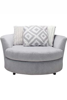 a grey couch with pillows on it and some white throw pillows in the back ground