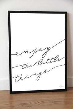 a black and white poster with the words enjoy the little things written in cursive writing