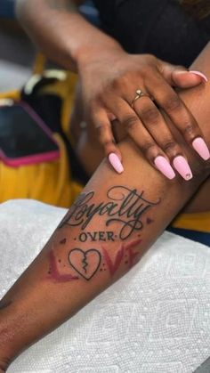 a woman with pink nail polish on her arm