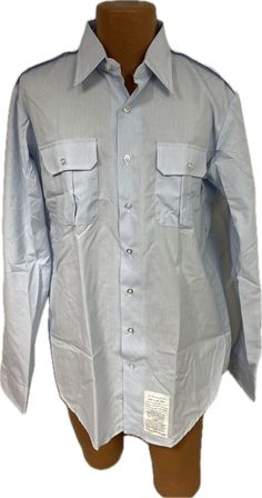 U.S. Air Force Issue Long Sleeve Dress Shirt Current Issue - USAF Shade 1550 Size: 17 x 38 (17 inch neck and 38 inch sleeve length) Condition: New Light Blue Long Sleeve Business Shirt, Fitted Light Blue Long Sleeve Shirt, Light Blue Fitted Long Sleeve Shirt, Light Blue Long Sleeve Shirt For Semi-formal Occasions, Formal Long Sleeve Shirt With Pockets, Light Blue Long Sleeve Dress Shirt For Spring, Long Sleeve Dress Shirt With Pockets For Work, Light Blue Long Sleeve Shirt With Pockets, Fitted Shirt With Pockets And Casual Collar