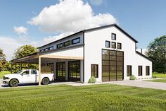 a white truck is parked in front of a garage