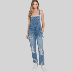 DISTRESSED 90s BOYFRIEND RIGID OVERALL 10.75" Rise, 27" Inseam Frayed hem with Destroy Bib pockets, front scoop pockets, back patch pockets Adjustable buckle straps, side button closures These denim overalls are the perfect one-piece for your everyday, fashion-forward style. 100% cotton Medium Wash Buttoned Overalls, Medium Wash Non-stretch Overalls, Fitted Full-length Medium Wash Overalls, Non-stretch Cotton Overall Jeans, Medium Wash Full-length Overalls With Pockets, Back Patch, Denim Overalls, Patch Pocket, Overalls