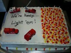 a birthday cake with cars on it and the words we're ready lighten