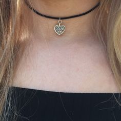 FREE SHIPPING WHEN YOU SPEND $15 - USE CODE FREESHIP2021 Necklace Details: Silver Lace Heart Choker Necklace 90s Choker Silver Heart Necklace on Black Cord Choker necklace with delicate lace design silver heart charm on black soft satin cord which is very gentle on your skin, very easy to wear. Lovely detailed heart charm. The Choker is available in a number of lengths and is fastened with a Lobster clasp. SHIPPING Policy (Please read☺) I ship worldwide using Standard International Post. Your pa Adjustable Heart Charm Choker For Party, Valentine's Day Heart Choker Necklace, Adjustable Heart Pendant Choker For Parties, Trendy Heart Charm Choker As Gift, Trendy Heart Pendant Choker As Gift, Trendy Heart Pendant Choker For Gift, Dainty Adjustable Metal Choker, Adjustable Heart Charm Choker Necklace, Adjustable Trendy Heart Choker Necklace