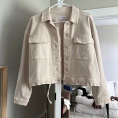 Perfect Button Up Creme Jacket. Worn Once Like Brand New. Spring Outerwear With Button Closure For Day Out, Spring Cropped Collared Jacket With Snap Buttons, Spring Outerwear With Button Closure For Everyday, Spring Outerwear With Buttoned Pockets For Day Out, Beige Spring Utility Jacket With Buttoned Pockets, Cream Outerwear With Buttoned Pockets For Spring, Cream Spring Outerwear With Buttoned Pockets, Spring Cream Outerwear With Buttoned Pockets, Spring Cropped Collared Jacket With Buttoned Pockets