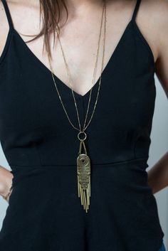 Ritz long Statement necklace with brass drop fringe Gold-tone Brass Long Chain Necklace, Gold-tone Long Brass Chain Necklace, Long Gold-tone Brass Chain Necklace, Long Bronze Brass Necklace, Brass Dangle Chain Necklaces, Gold Fringe Metal Necklace, Handmade Long Brass Chain Necklace, Gold Fringe Metal Necklaces, Bohemian Brass Jewelry With Fringe