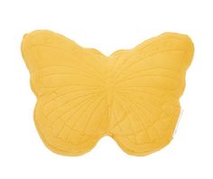 a yellow butterfly shaped pillow on a white background