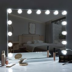 a vanity mirror that has lights on it