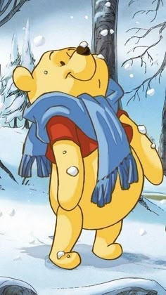 a winnie the pooh character is standing in the snow