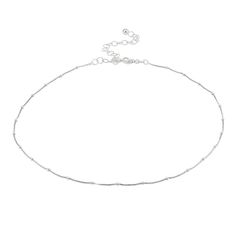 This unique choker necklace features an Italian box chain with small station beads. This dainty choker is 13" plus a 3" extender. It is crafted of fine sterling silver and secures with a spring ring clasp. Product Details Metal Type sterling-silver Metal Stamp 925-sterling Weight 2.3GR Length 13IN Width 1MM Clasp Type spring-ring Chain Type box Chain Length 13 Minimalist Choker Chain Necklace With Lobster Clasp, Minimalist Adjustable Chain Necklace With Lobster Clasp, Minimalist Link Choker With Delicate Chain, Minimalist Choker With Delicate Chain Link, Minimalist Choker With Delicate Link Chain, Minimalist Silver Choker With Lobster Clasp, Minimalist Adjustable Charm Necklace With Chain, White Gold Adjustable Chain Choker Necklace, Minimalist White Gold Chain Necklace With Lobster Clasp