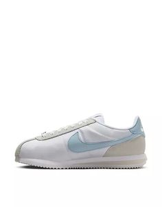 Nike Cortez TXT sneakers in white and blue | ASOS Nike Sneakers With White Contrast Sole, White High-top Sneakers With Contrast Sole For Jogging, White Running Shoes With Contrast Sole And Round Toe, High-top Jogging Sneakers With Contrast Sole, White High-top Sneakers With Boost Midsole For Jogging, White Sneakers For Sports With Rubber Sole, White High-top Jogging Sneakers With Rubber Sole, White Low-top Basketball Shoes With Contrast Sole, White Running Sneakers With Rubber Sole