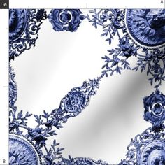 a blue and white wallpaper with an ornate design on it's side,