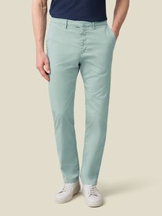 Elevate your spring-summer wardrobe with our cotton chinos, crafted in Northern Italy from lightweight and durable whipcord cotton. This breathable fabric is blended with 3% elastane for added stretch ensuring a more comfortable and easier fit.    Our chinos feature a mid-rise and slightly tapered fit, designed to provide a refined and sophisticated look. With a focus on practicality, this piece is tailored with four convenient pockets and bespoke details such as a concealed triple button closur Turquoise Men, Cotton Chinos, Northern Italy, Dressed Down, Smart Casual, Summer Wardrobe, Breathable Fabric, Casual Looks, Bespoke