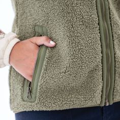 With the Stratus Vest, you might actually look forward to cloudy, chilly days. This eco-conscious layer offers warmth, style, and comfort all wrapped in a decadent 100% recycled polyester faux shearling fleece. While it may be love at first sight, the details of this vest will make you fall head over heels. This curly-piled fleece is matched with a mesh backer that serves two important functions: breathability and a smooth texture that makes sliding on over even the fluffiest sweaters a breeze. Casual Warm Snug Outerwear, Snug Casual Outerwear With Fleece Lining, Casual Snug Outerwear With Soft Texture, Casual Snug Outerwear With Fleece Lining, Casual Soft Texture Outerwear For Spring, Casual Outerwear With Soft Texture And Cozy Fit, Casual Outerwear With Fleece Lining, Casual Soft-texture Outerwear For Spring, Casual Soft Winter Outerwear