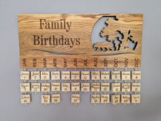 a wooden calendar is hanging on the wall