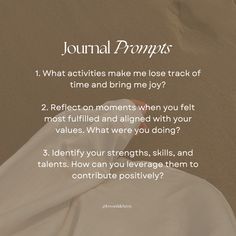 a white sheet with the words journal prompts on it and an image of sand in the background