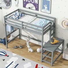 a child's bedroom with a bunk bed and toys