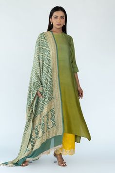 Green and yellow ombre kurta in an asymmetric silhouette. Comes with a banarasi dupatta featuring woven floral zari pattern and bandhej motifs. - Aza Fashions Pista Green Kurta With Sheer Dupatta Traditional Drape, Straight Kurta With Sheer Dupatta In Art Silk, Art Silk Kurta With Sheer Dupatta, Pista Green Kurta With Sheer Dupatta, Pista Green Jamawar Dupatta In Traditional Drape, Pista Green Cotton Silk Dupatta For Diwali, Transitional Slub Silk Dupatta In Traditional Drape, Transitional Art Silk Kurta With Sheer Dupatta, Designer Wear Slub Silk Dupatta In Traditional Drape