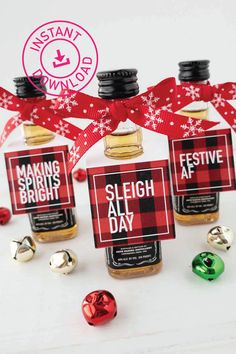 three bottles of sleigh all day with bells around them